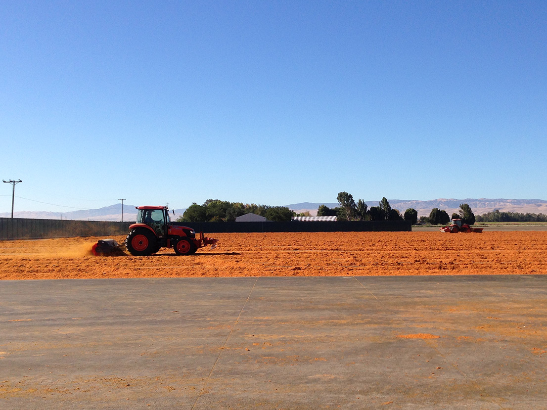 tractor in tomato field