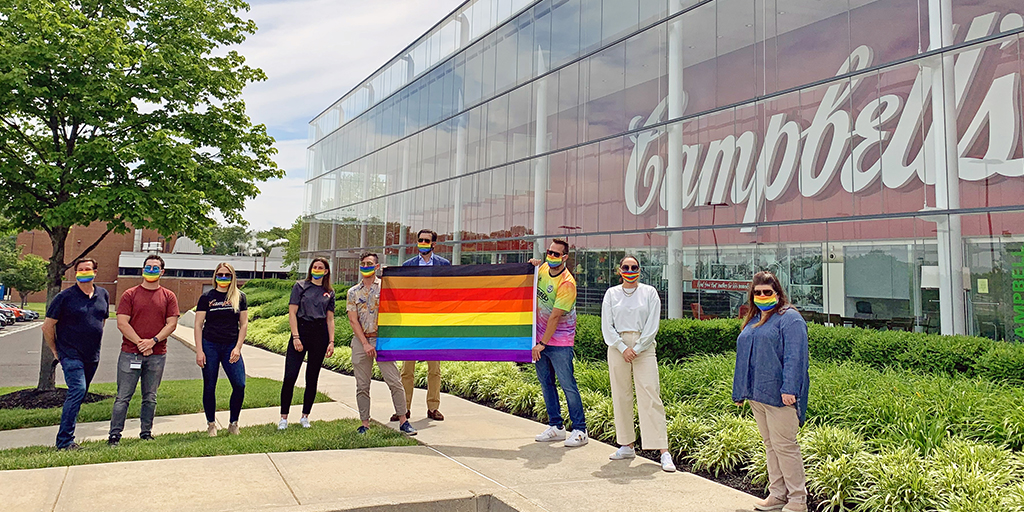 employees with pride flag