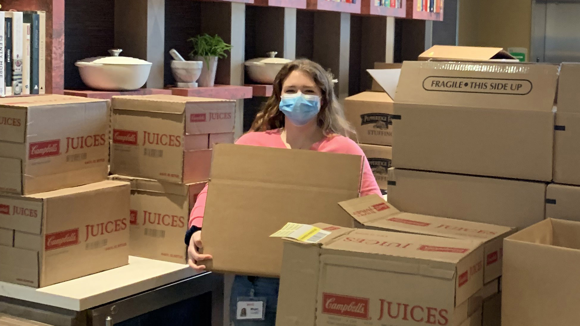 woman holding donation box