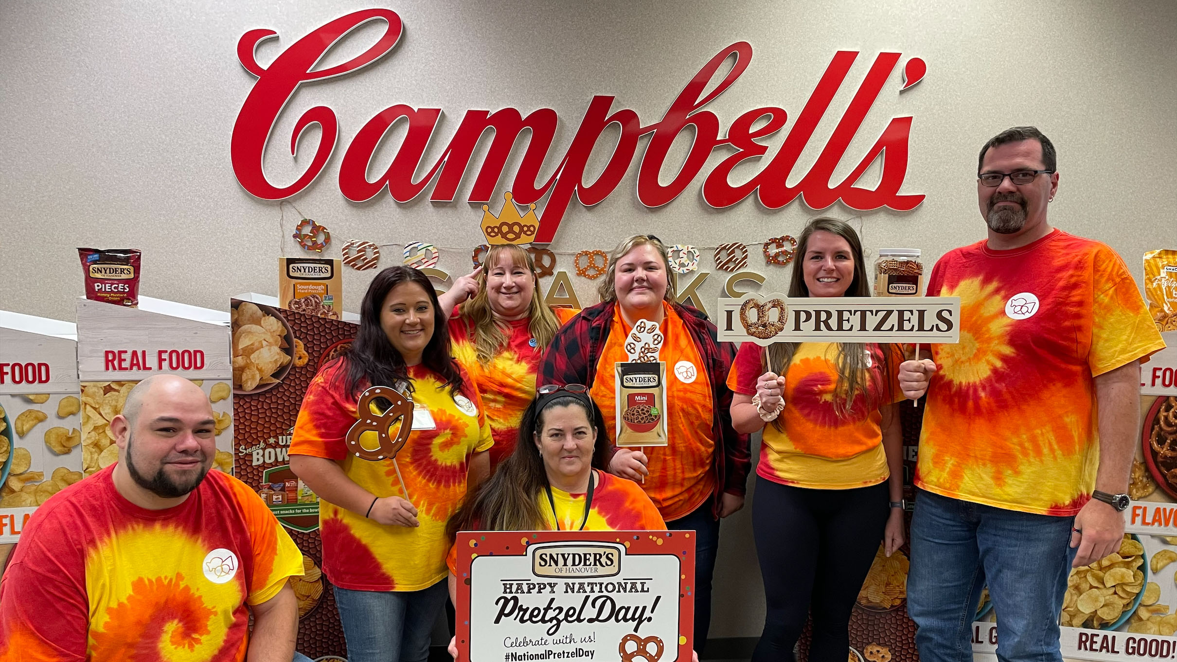 campbell snacks hanover employees showing their pretzel pride with pretzel signs