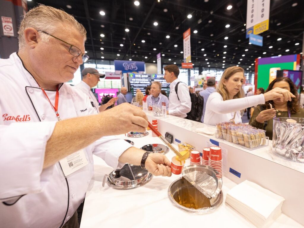 A team member from Campbell's Foodservice serves a soup sample to attendees at the National Restaurant Association Show 2026