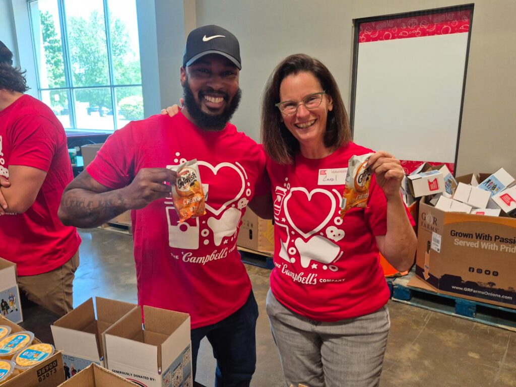 Employees sorting food donations at a food pantry.
