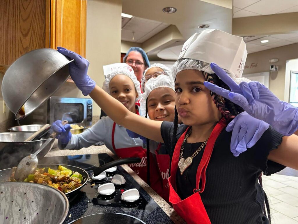 Students participating in a Cooking Matters lesson.